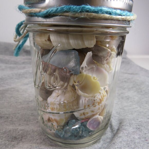 Jar of REAL sea shells and blue sparkly vase filler at bottom - Picture 5 of 9